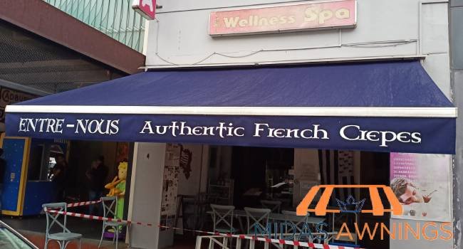 retractable-awning-replacement-services-midas-awnings-singapore-commercial-raffles-city-1