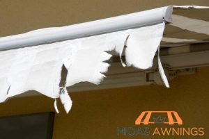 9 Key Indicators Your Retractable Awning Needs Repair 3 visible-tears-9-key-indicators-your-retractable-awning-needs-repair-awning-repair-midas-awnings-singapore