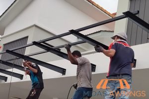 7 Essential Maintenance Tips to Make Your Fixed Awning Last in Singapore 2 inspecting-for-rust-on-metal-parts-7-essential-maintenance-tips-to-make-your-fixed-awning-last-in-singapore-fixed-awnings-midas-awnings-singapore