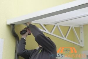 7 Essential Maintenance Tips to Make Your Fixed Awning Last in Singapore 3 tightening-loose-screws-and-bolts-7-essential-maintenance-tips-to-make-your-fixed-awning-last-in-singapore-fixed-awnings-midas-awnings-singapore