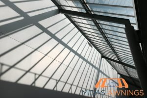 Retractable Awning Installation in Singapore - Landed, Newton 24 block-uv-rays-pros-and-cons-of-polycarbonate-roof-everything-you-need-to-know-polycarbonate-roofing-long-form-midas-awning-singapore