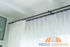 How High Should You Hang Your Curtain Rod in Singapore: Installation Tips for Perfect Placement 4 consider-wall-and-ceiling-how-high-should-you-hang-your-curtain-rod-in-singapore-installation-tips-for-perfect-placement-curtain-rod-installation-midas-awnings-singapore