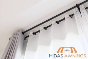 How High Should You Hang Your Curtain Rod in Singapore: Installation Tips for Perfect Placement 2 follow-the-standard-height-how-high-should-you-hang-your-curtain-rod-in-singapore-installation-tips-for-perfect-placement-curtain-rod-installation-midas-awnings-singapore