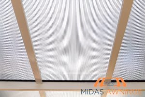 Retractable Awning Installation in Singapore - Landed, Newton 23 lightweight-pros-and-cons-of-polycarbonate-roof-everything-you-need-to-know-polycarbonate-roofing-long-form-midas-awning-singapore